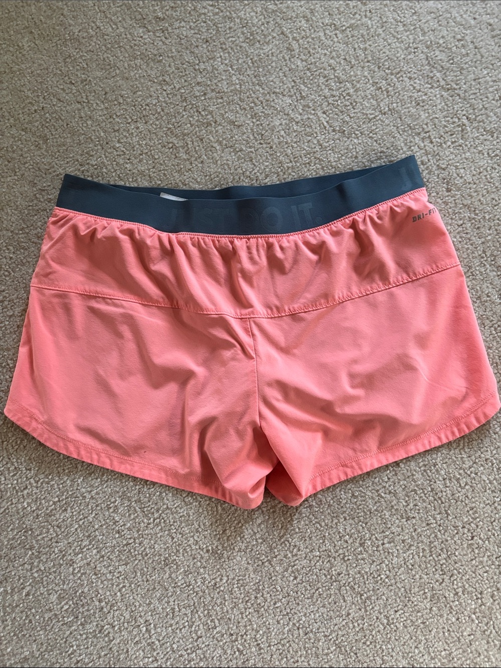 Nike Women's Coral Pink Athletic Shorts with grey Waistband - Picture 2 of 3